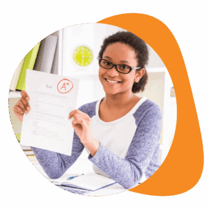 Middle school student showing A+ paper as a result of K12 online tutoring