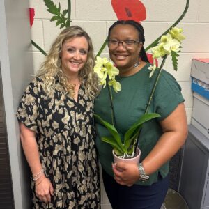 Si Acevedo with Ms. Narquita Snowden from Ruffner School during a Norfolk Public Schools site visit, highlighting Brainfuse online tutoring for K-12 schools and school-level implementation support.
