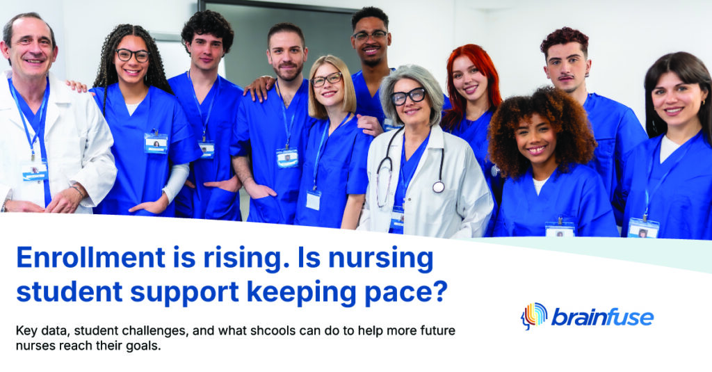Nursing students and instructors in blue scrubs and white coats gathered in a college classroom, representing nursing education and student support.